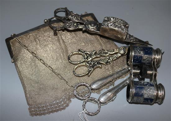 A plated mesh evening purse, pair of opera glasses, badges, candle snuffers and two pairs of grape scissors.